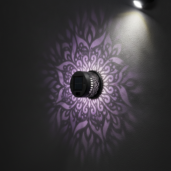 Close-up of a single GloPetal solar light with soft lavender glow against a charcoal background.